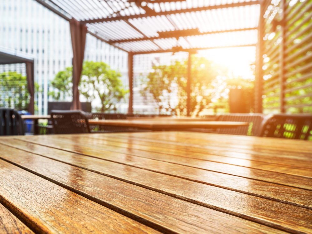 Wooden table in the outdoor coffee room